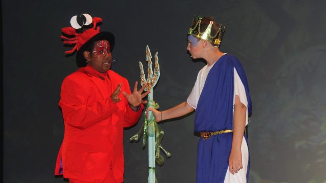 students performing in school musical production
